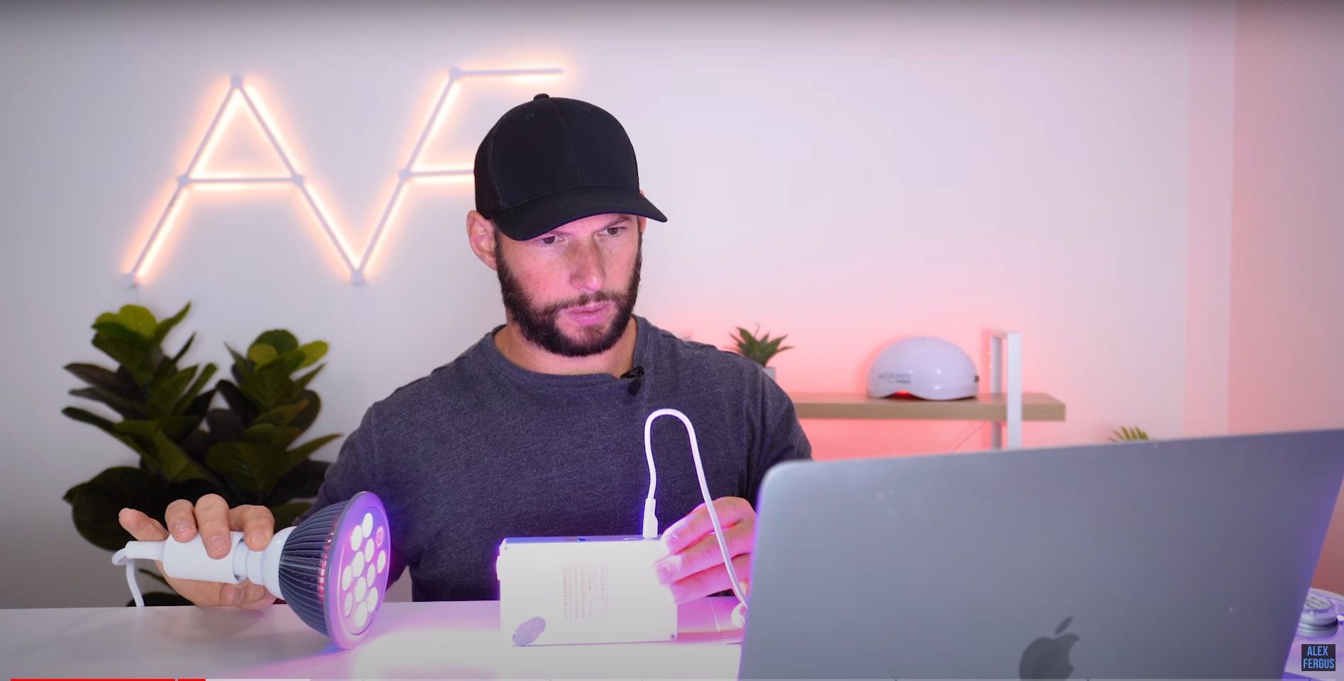 Alex uses a spectrometer to measure the wavelengths in this light therapy device