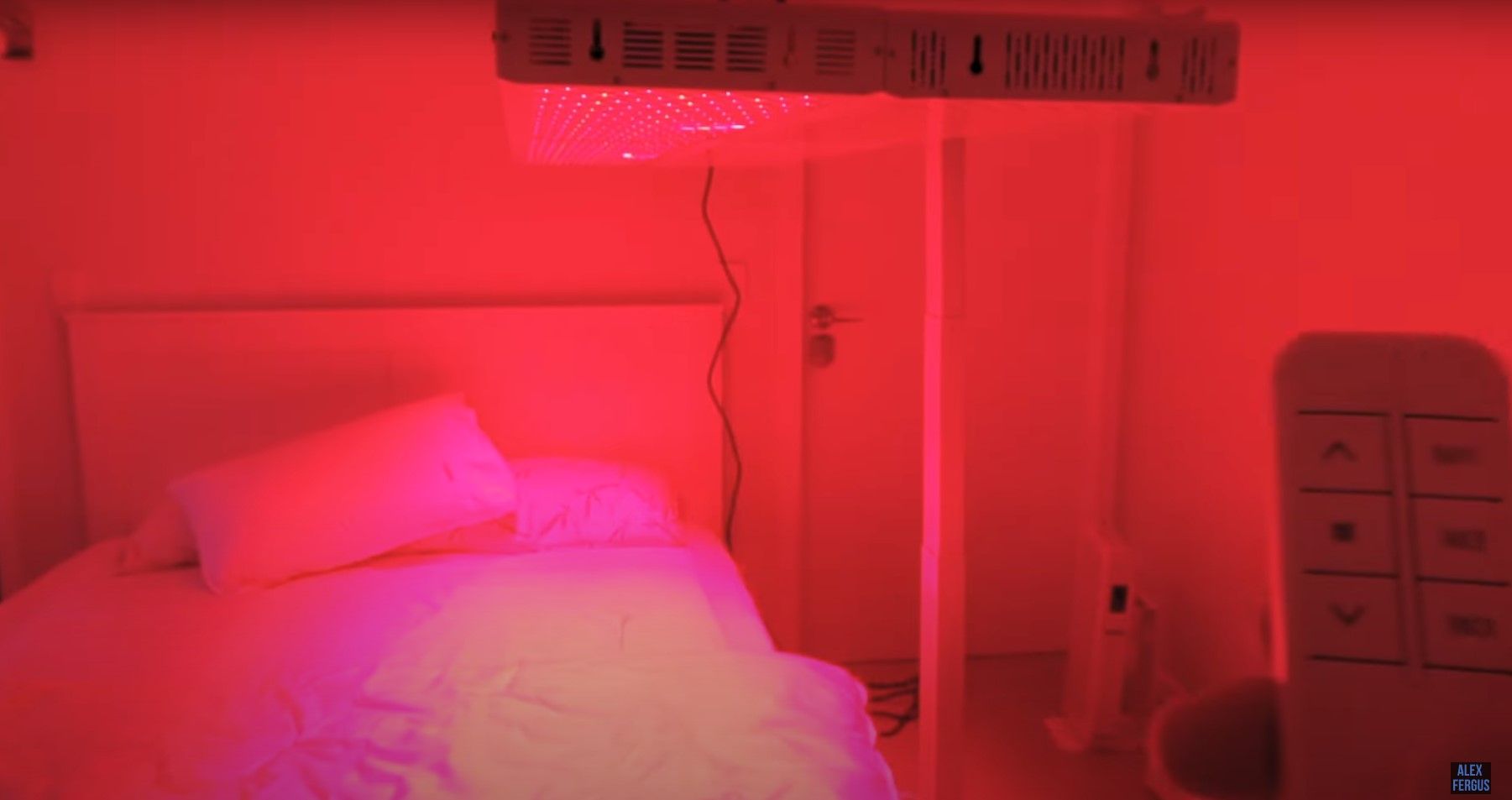 Red light therapy panels above the bed